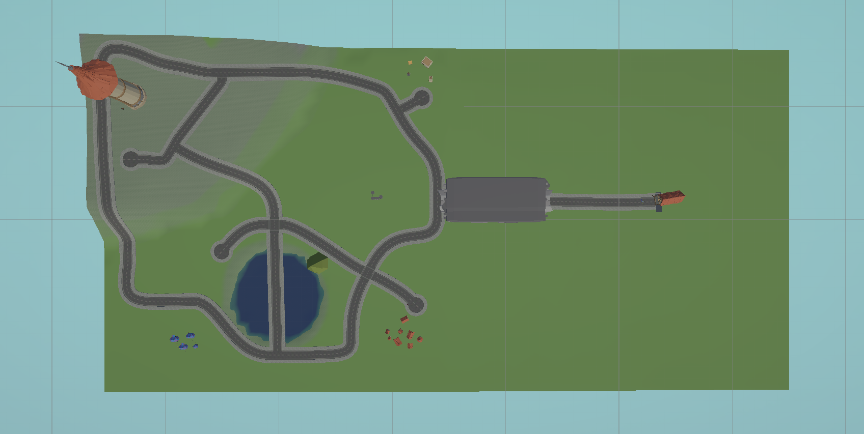 An aerial perspective of the test environment. A path winds through a large open space thaat is populated with various landmarks and points of interest. 